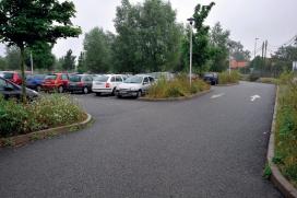 Parking met drainerende bekleding en wegdek met reservoirstructuur in Lomme (Frankrijk)
